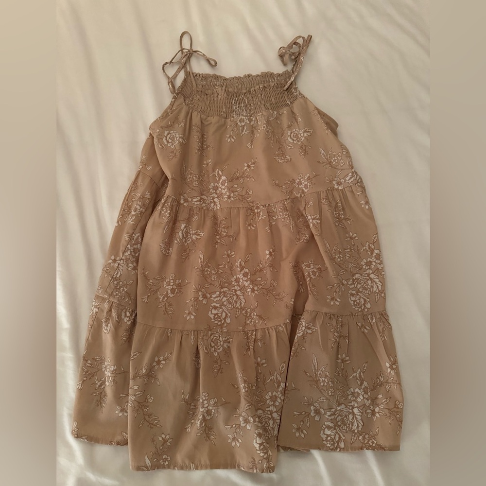 Beige tank top dress with floral pattern